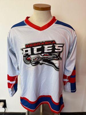 Custom hockey jerseys for the Nebraska Aces Designed, printed, and produced in-house.