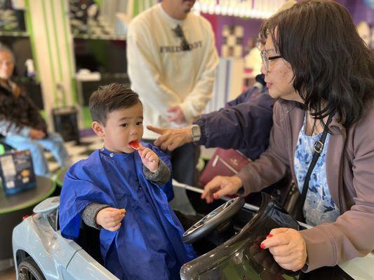 Leo's 1st in salon haircut! They have a "first haircut" package that's adorable!