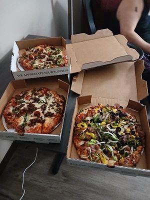 A beautiful picture of all of our pizzas together