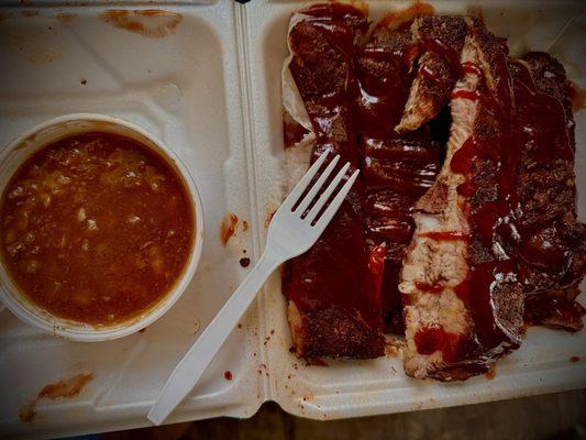 Half slab of 6 big ribs (with a fork just for scale b/c I'm off plastic) and their amazing baked beans! There are lots of other sides!