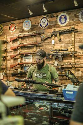 Sales staff at Brevard Armory