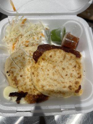 Pupusa with chicken and one with beef