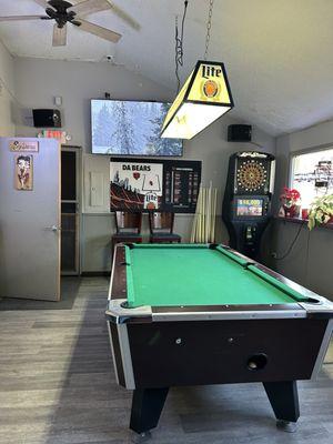 Small area with pool and darts.