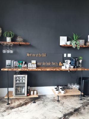 Their refreshment area with water, drinks and sometimes a little wine