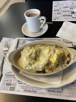 Biscuits, scrambled eggs, peppers, onions, home fries, American cheese, sausage gravy en casserole, This is a fantastic special 