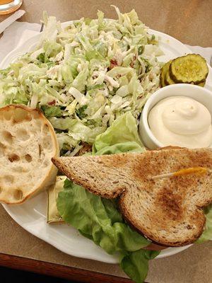 Half a salad and BLTC on wheat bread