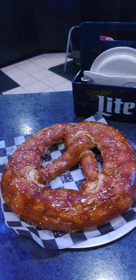 24 oz pretzel with white queso dipping sauce. It's incredible