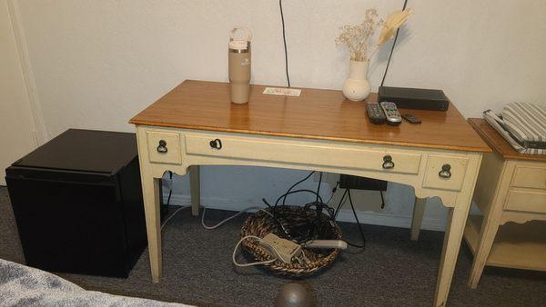 Basket of old extension cords for the space heater. Oh, and that's a mini fridge on the floor.