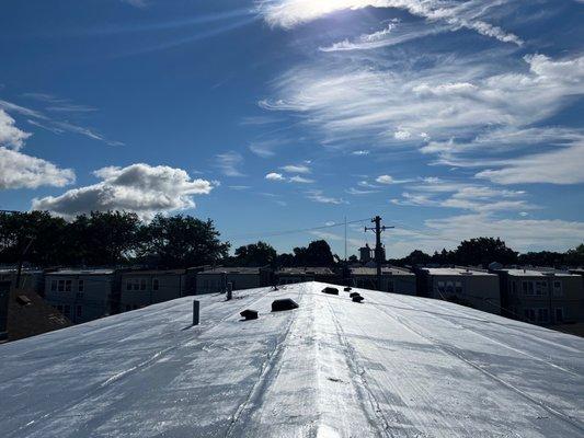 Flat roof membrane over low-slope roof