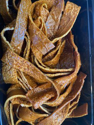 Spicy dried tofu ribbons.