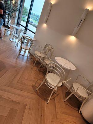 Seating inside. Note: There is another sitting area to the left of this - June 2025