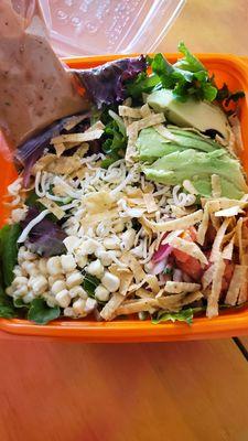 BBQ ranch salad w/avo as protein. Blk beans, corn, pico, tortilla strips, cheese, greens, BBQ ranch dressing.