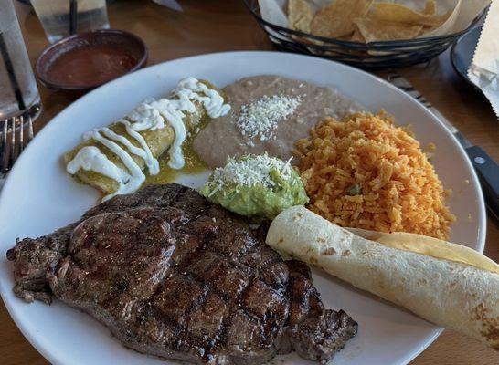 EL TAMPIQUEÑO Ribeye steak and chicken enchilada.
