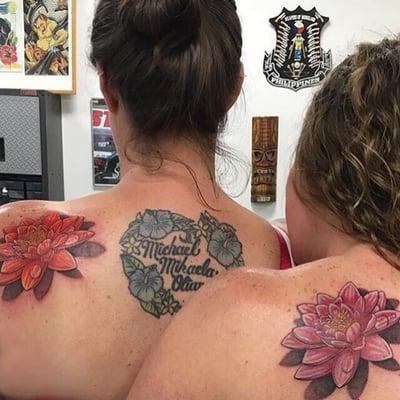 Cousin lotus tattoos
