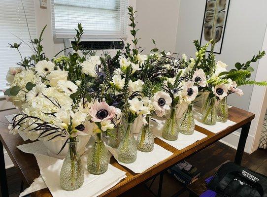 Bud vases used on the cocktail tables