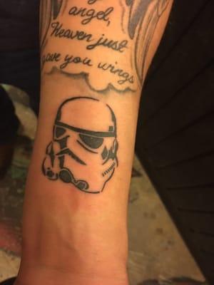 Outline of a Stormtrooper. The artist loves Star Wars too and couldn't wait to do this piece.