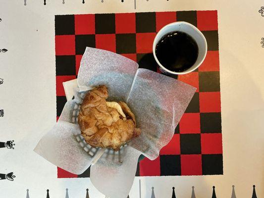 Bacon egg and cheese croissant, drip coffee.