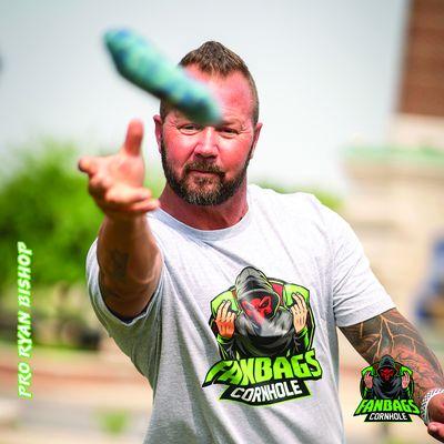 People playing cornhole