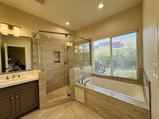 Mitered tile work, not metals and 3/8" glass doors and panel