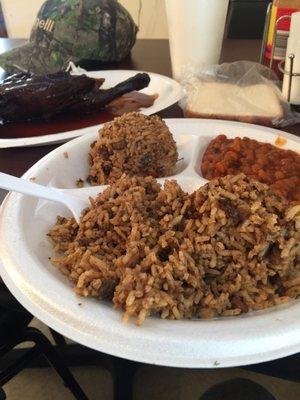 Two scoops of rice dressing, BBQ chicken with BBQ beans! Pretty filling for $10 I think.
