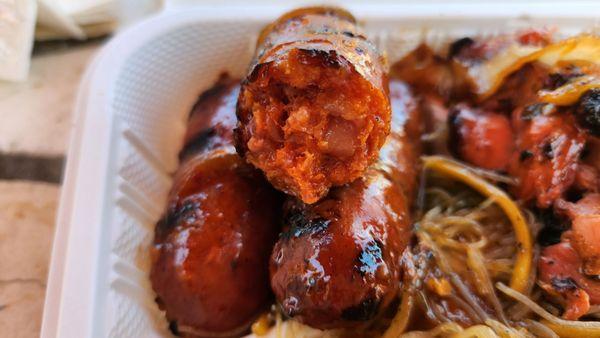 Sausage - like a sweet Asian sausage but soft. No snap to the bite. Good.