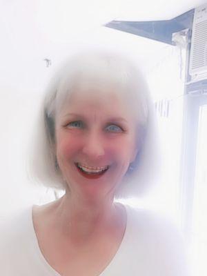 Pokeel fooling around with eye and lip liners to take 20 years off!
Look at the great hair cut.