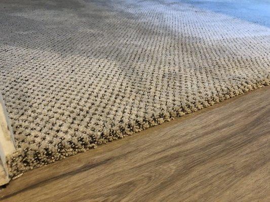 I love how they rolled the carpet at the edge, its such a classy transition from the vinyl to carpet.
