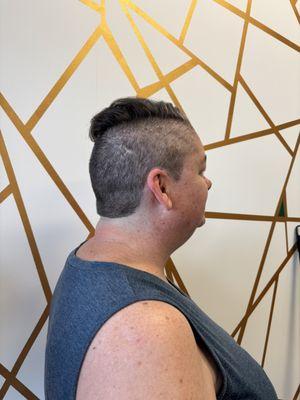 Bold shaved hairstyle for women. This style can be customized with various lengths and designs