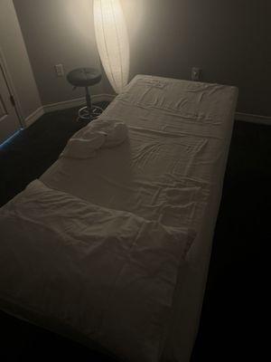 Massage table. Basically plyboard with thin cushion