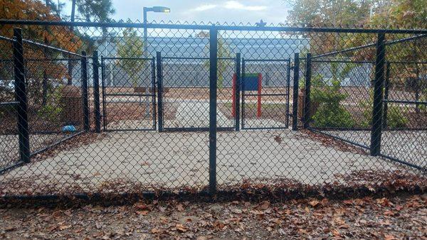 Concrete double gated entry with two gates to enter and exit through?
