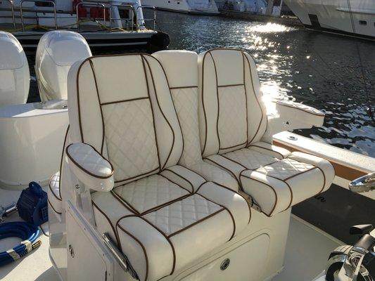 We've been doing custom canvas and upholstery since 1994 and would be glad to work on your boat.
 Contact :
 954-298-0940  Rob