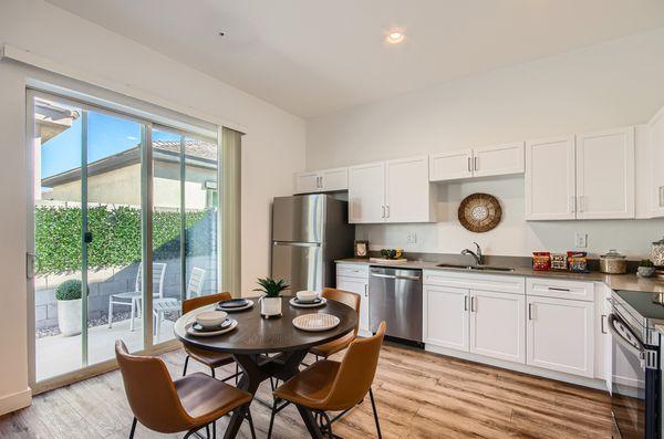 Fully Equipped Kitchen Includes Frost-Free Refrigerator, Electric Range, & Dishwasher