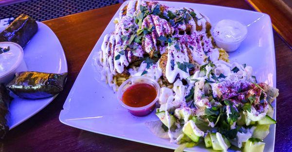 Shish Tawouk Skewers and stuffed grape leaves