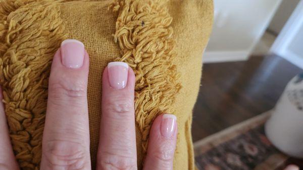 Uneven application of white tip.