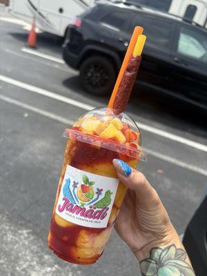 Mangonada - mango, chamoy, tamarind straw, & tajin. Soooo good!