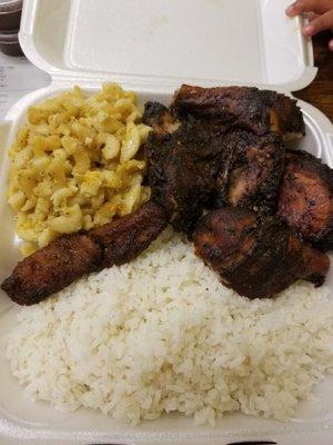 Large jerk chicken with mac & cheese, plain rice and plantains. Plantains only came with large order.