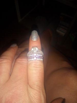 One pink diamond one regular diamond both 925