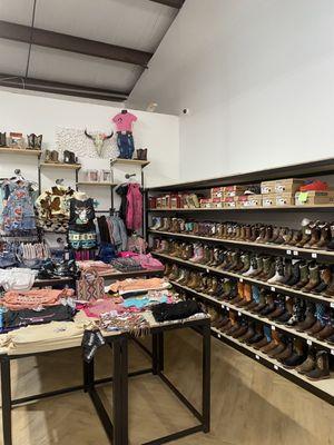 The girls section with clothing and boots.