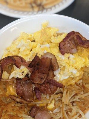 Easily my favorite thing on the menu bacon hash brown bowl