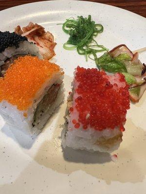 Sushi, kimchi, wakame and variety of tako su