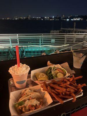Strawberry Banana boozy milkshake, shrimp tacos, cheese burger, sweet potato fries, and mule!