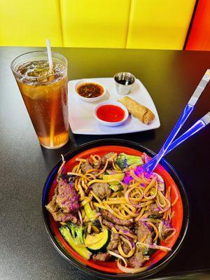 Beef lo mein with an eggroll