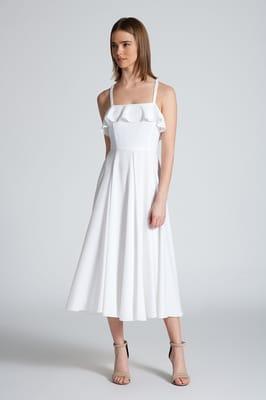 Love a white dress-especially so pretty!  ox