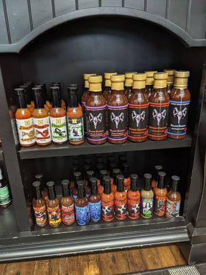 A shelf of sauces in the store