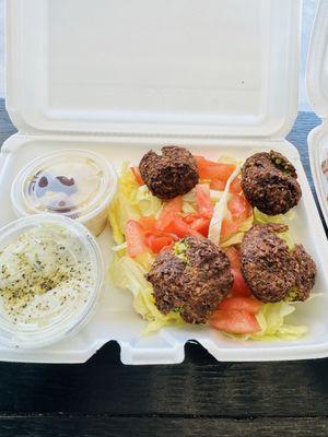 Falafel appetizer with a side of hummus