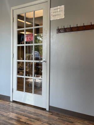 This is the door to the back , where they bring you in. You can see the bad paint job on this door.