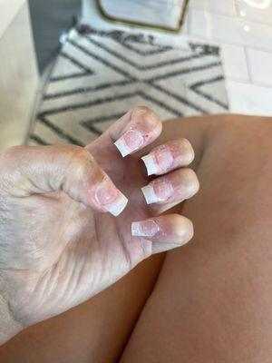 How my nails were left when I left his salon.