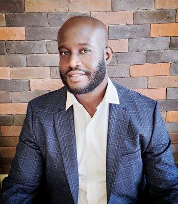 Domaine Scully, Licensed Real Estate Broker and Mortgage Loan Officer.