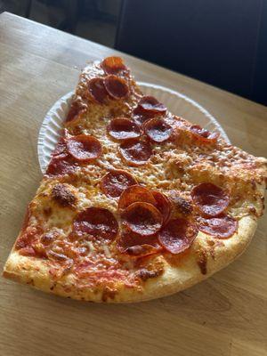 Pepperoni pizza slice