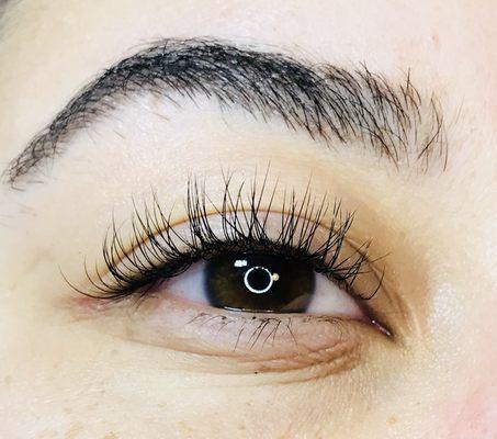 Fluffy and textured set of lash extensions. 3 types of lashes used for safe and healthy lashes